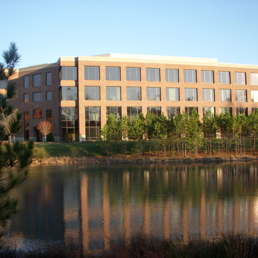 office building overlooking lake