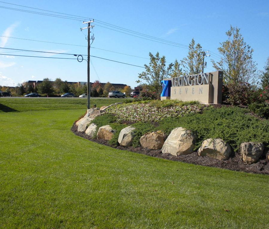 sign with greenery