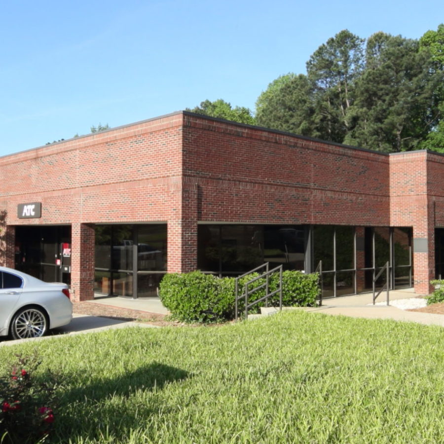 Brick Building with green grass